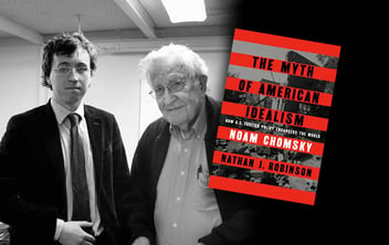 A black-and white photograph of Nathan J. Robinson and Noam Chomsky standing together.